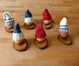 Eierständer mit Eierwärmer / Eiermützen